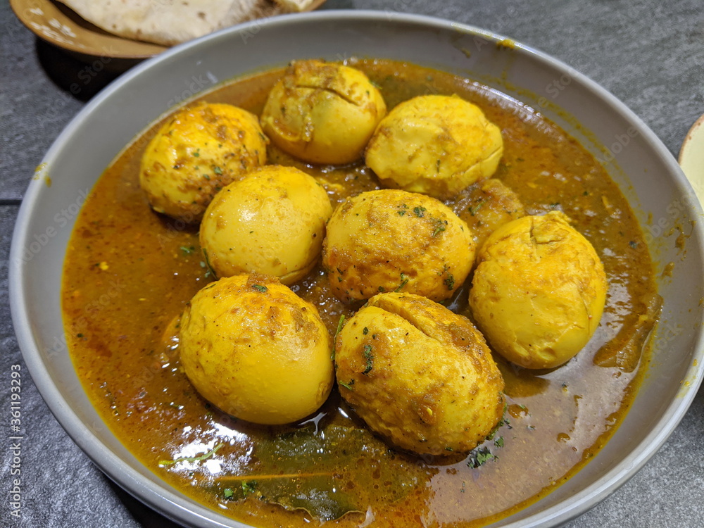 An Indian spread of spicy Egg curry or Egg Masala in a bowl An Indian spread of spicy Egg curry or Egg Masala in a bowl