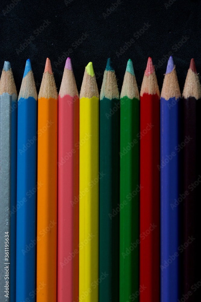 colored pencil on black background colored pencil on black background