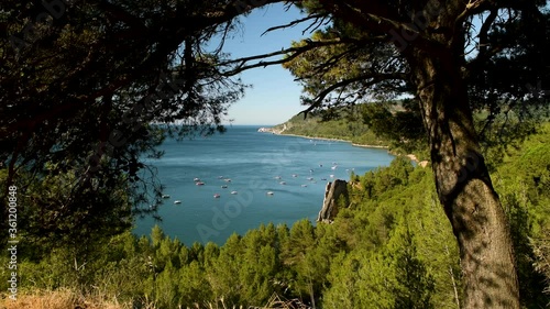 View of a bay with boats at the Arrabida Natural Park near Setúbal, Portugal