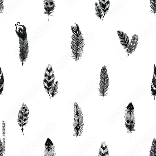 Detailed feathers and crystals in boho style. Seamless pattern.