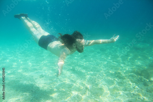 Man swimming underwater