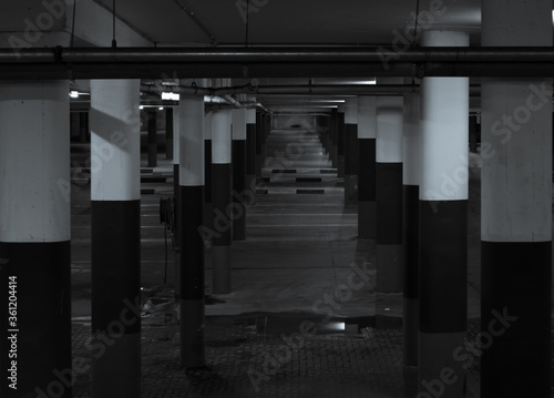 Empty parking lot with pillars.