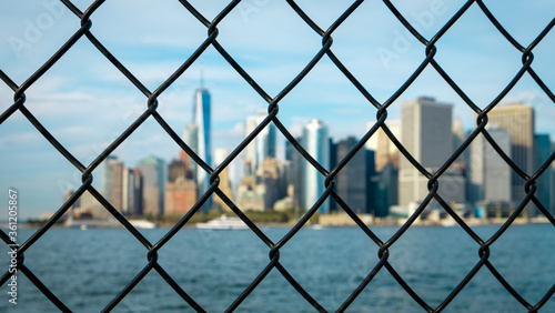 New York skyline through a fence