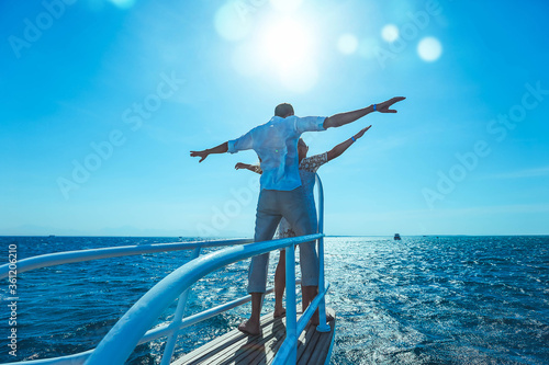 Couple on a yacht in the pose of the Titanic