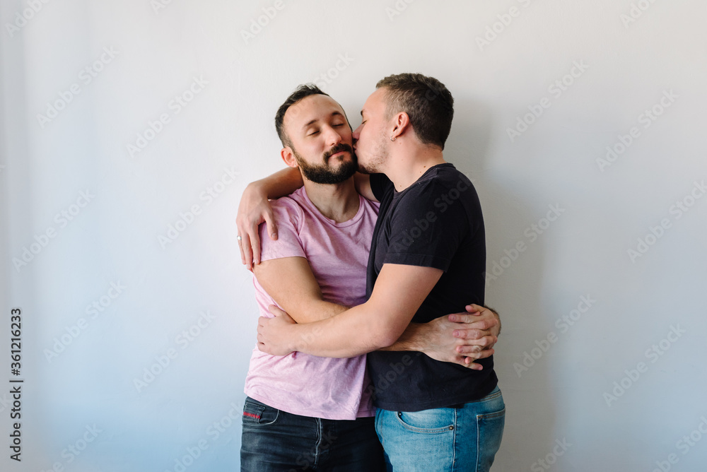Two gay man hugging each other. Two gay man hugging each other.