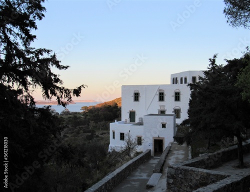 The entrance to the Cave of the Apocalypse, where John of Patmos received his visions that he recorded in the Book of Revelation, with a view of the sea on the island Patmos in Greece