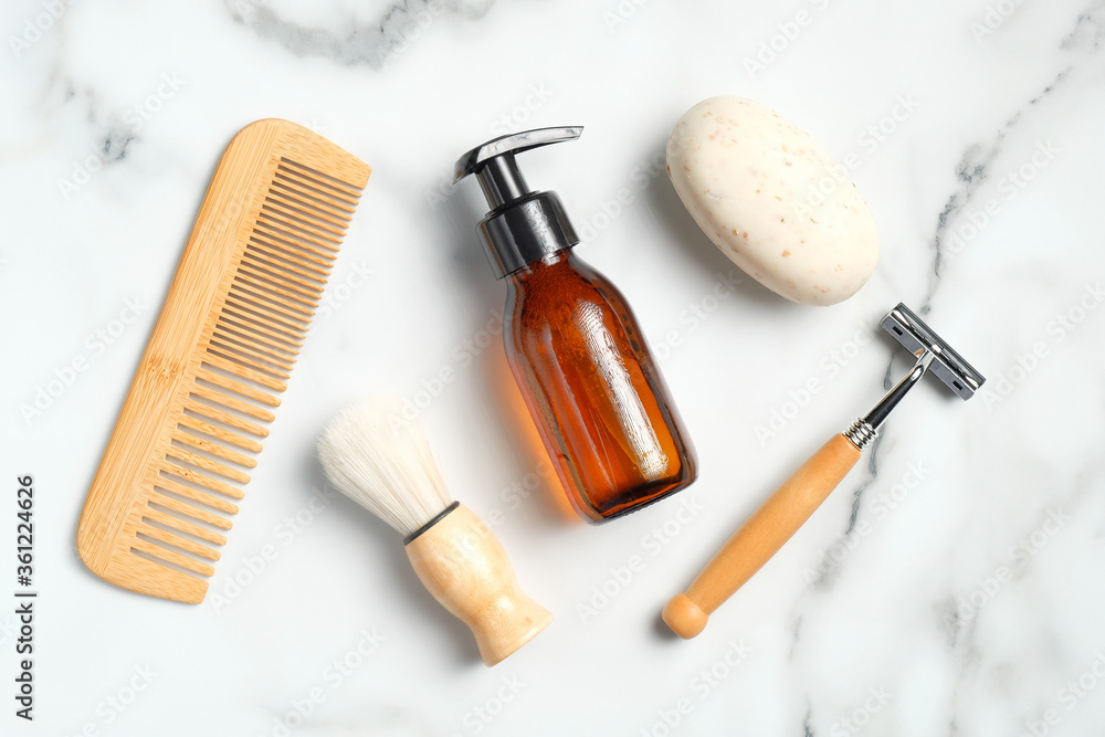 Eco-friendly bathroom accessories and shaving tools for man on marble table. Flat lay, top view. Zero waste, sustainable lifestyle concept. Eco-friendly bathroom accessories and shaving tools for man on marble table. Flat lay, top view. Zero waste, sustainable lifestyle concept.