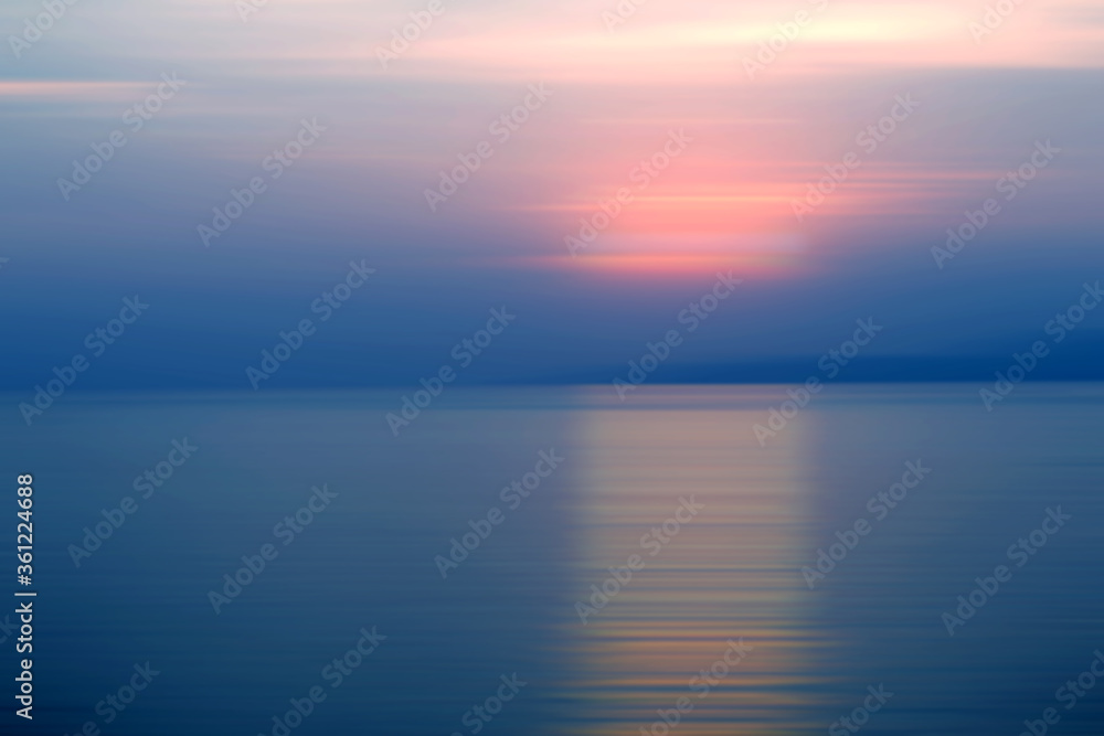 Abstract background motion blur sunset on the sea