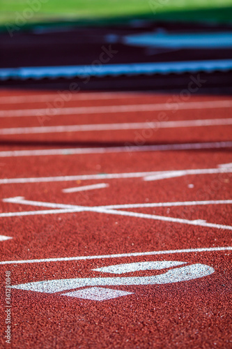 Red running sport track background and texture. Sport running track concept.