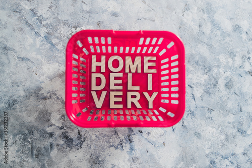 online grocery shopping, shopping basket with Home Delivery text in it