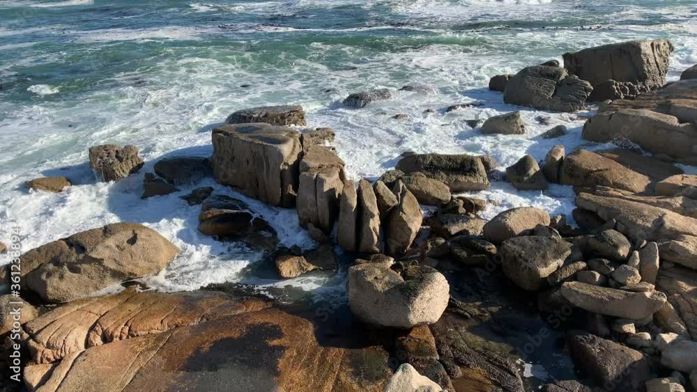 Rocky shores being battered by waves Rocky shores being battered by waves