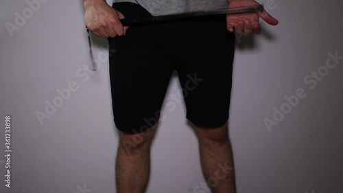 Man takes out the telescopic bat and threaten with it