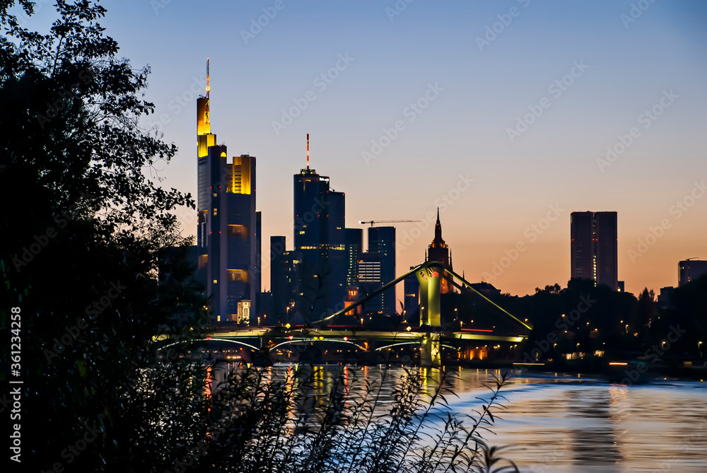 Naklejka premium Down and skyline twilight photographed in Frankfurt am Main, Germany. Picture made in 2009.