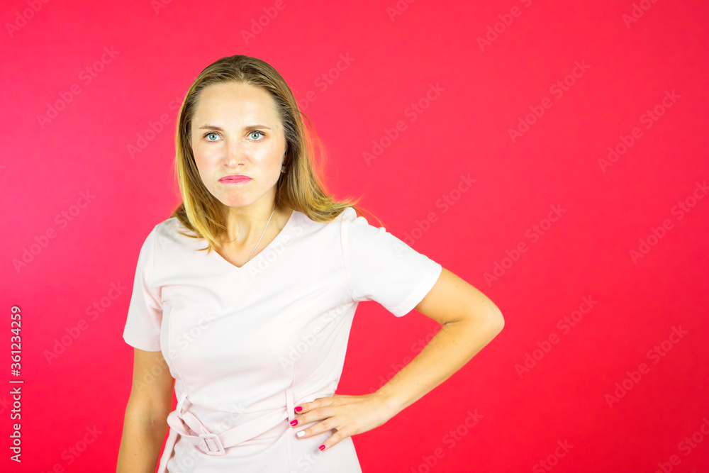Angry young woman looking at camera Angry young woman looking at camera