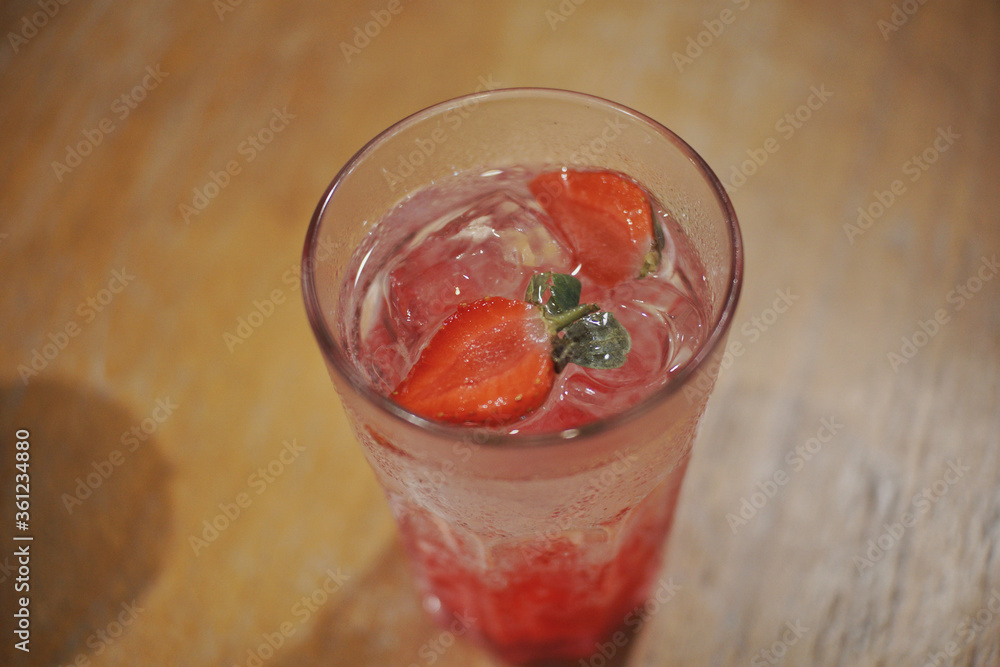Close up of a glass of ice strawberry squash. Close up of a glass of ice strawberry squash.