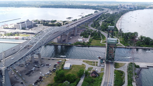 Panoramic Aerial Image of a Highway Bridge with a channel  during clear summer weather