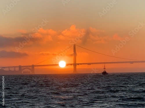 Golden gate sunset on a boat