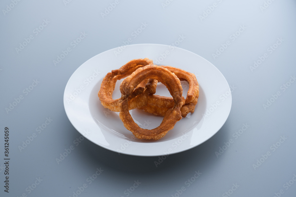 Traditional food jiaoquan in old Beijing of China. Old Beijing specialty food jiaoquan. Fried doughnut, a traditional snack in Beijing. Traditional food jiaoquan in old Beijing of China. Old Beijing specialty food jiaoquan. Fried doughnut, a traditional snack in Beijing.