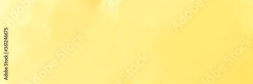 Butter yellow background. Pale yellow textured background