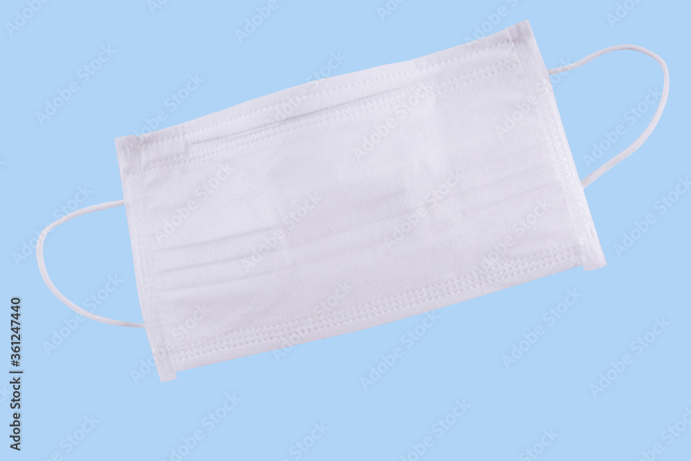 Blank white face mask on a white background.. Blank white face mask on a white background..