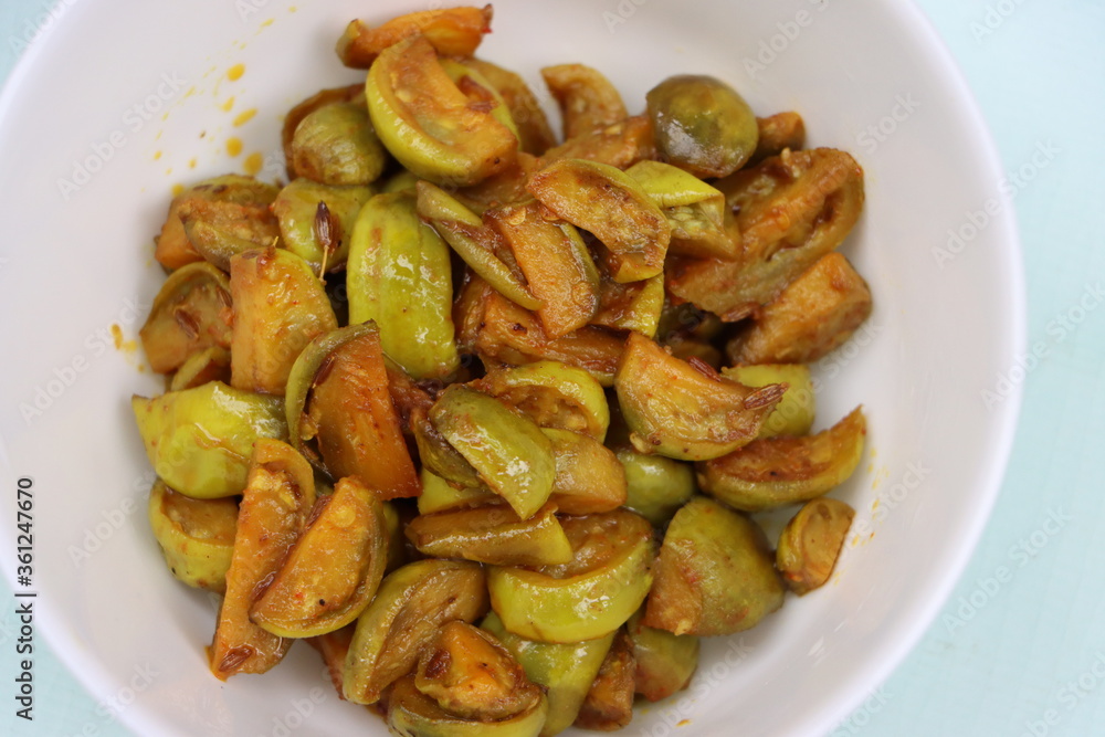 Wild eggplant dry fry, Solanum aethiopicum, traditional local food Wild eggplant dry fry, Solanum aethiopicum, traditional local food
