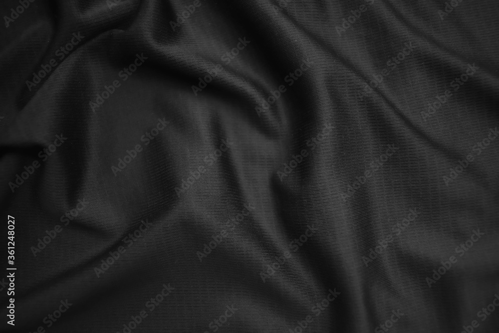 Background texture black cloth. Abstract dark wavy soft. Fabric is wrinkled. Fashion luxury style. Background texture black cloth. Abstract dark wavy soft. Fabric is wrinkled. Fashion luxury style.