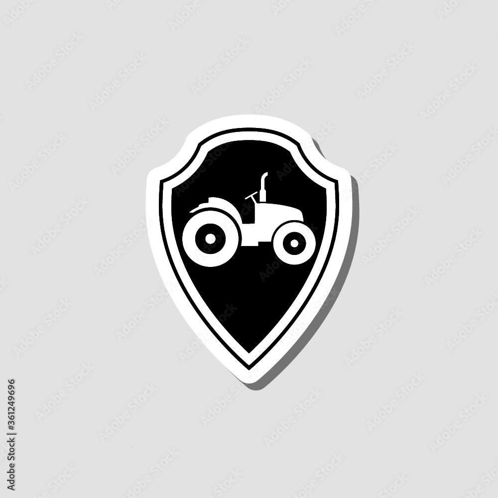 Tractor on shield sticker isolated on gray background