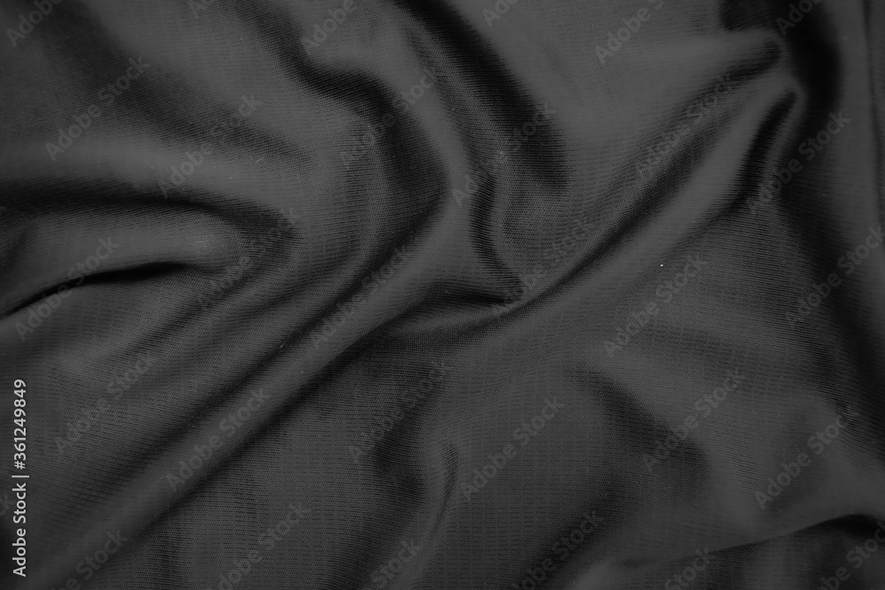 Fototapeta premium Background texture black cloth. Abstract dark wavy soft. Fabric is wrinkled. Fashion luxury style.