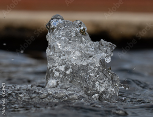 Bubbling water in fountain closeup