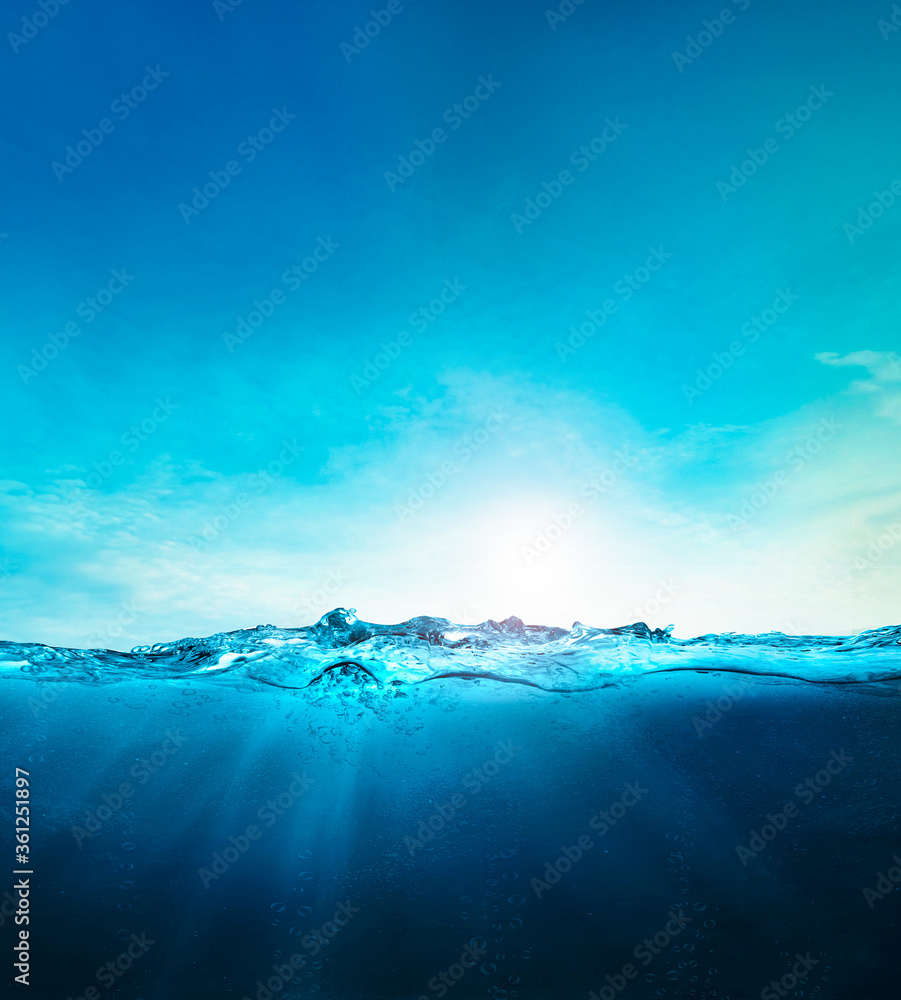 blue ocean underwater , deep ocean, blue water waves with sun beam
