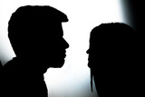 Silhouettes of man and woman.