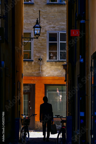Stockholm, Sweden June 29, 2020 A man walking on Tradgardstvargrand in the Old Town or Gamla Stan