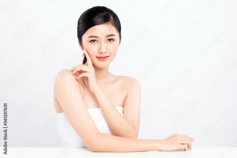 Beautiful Young asian Woman touching her clean face with fresh Healthy Skin, isolated on white background, Beauty Cosmetics and Facial treatment Concept Beautiful Young asian Woman touching her clean face with fresh Healthy Skin, isolated on white background, Beauty Cosmetics and Facial treatment Concept