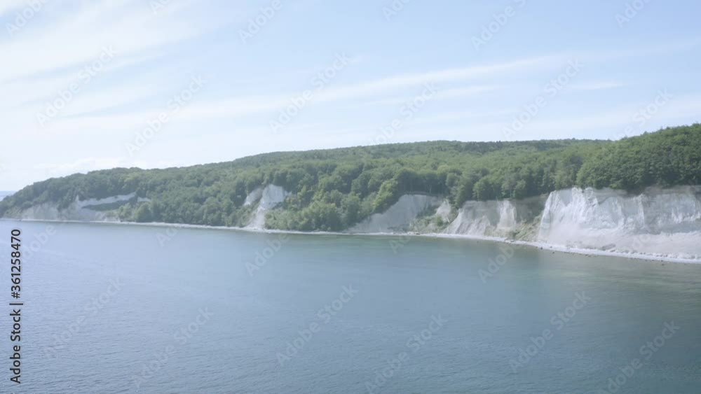 Drone Aerial Shot of the chalk cliffs on Ruegen Rügen in Germany in beautiful light with green and blue seawater, Europe Drone Aerial Shot of the chalk cliffs on Ruegen Rügen in Germany in beautiful light with green and blue seawater, Europe