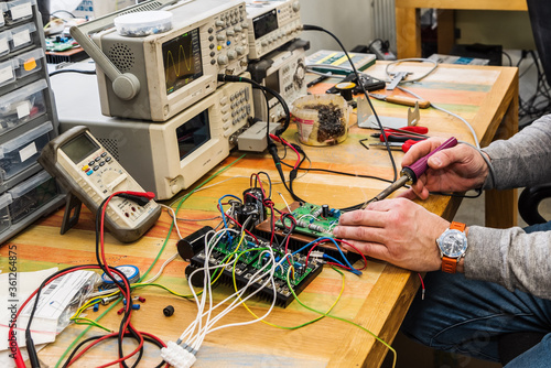 Electronic Engineer at work. Work tools and equipment. The picture was taken in the technical department of the plant photo