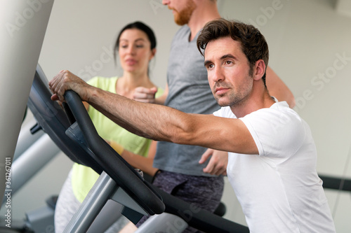 Fit people working out at the gym