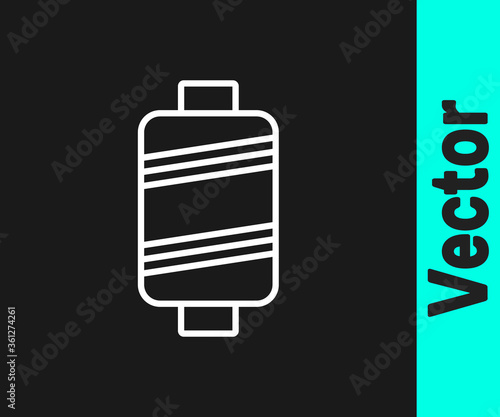 White line Sewing thread on spool icon isolated on black background. Yarn spool. Thread bobbin. Vector Illustration.