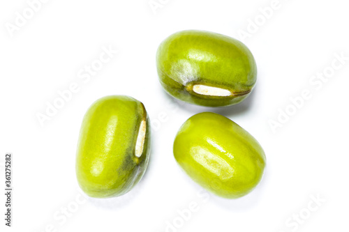 Green mung beans isolated on white background. Top view. Flat lay.
