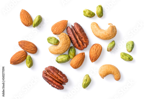 unsalted mixed nuts isolated on white background, top view