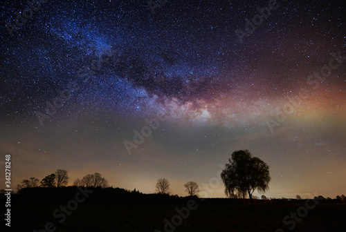 Nght sky and landscape with star, milkyway © Marcin