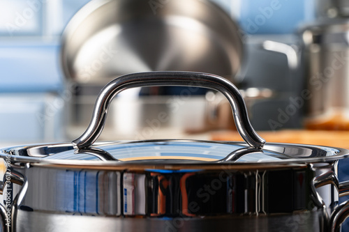 Set of aluminum cookware on kitchen counter