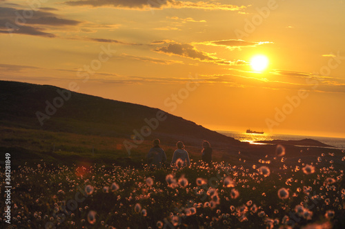 Magic sunset with boat and people. Nature cotton backdrop.