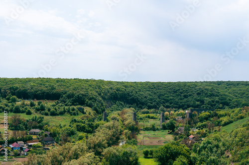 View of the ruins of the old-time viaduct, aqueduct, tourist route Podilsky Tovtra, Ukraine, Khmelnitsky region, Zubrivka village.