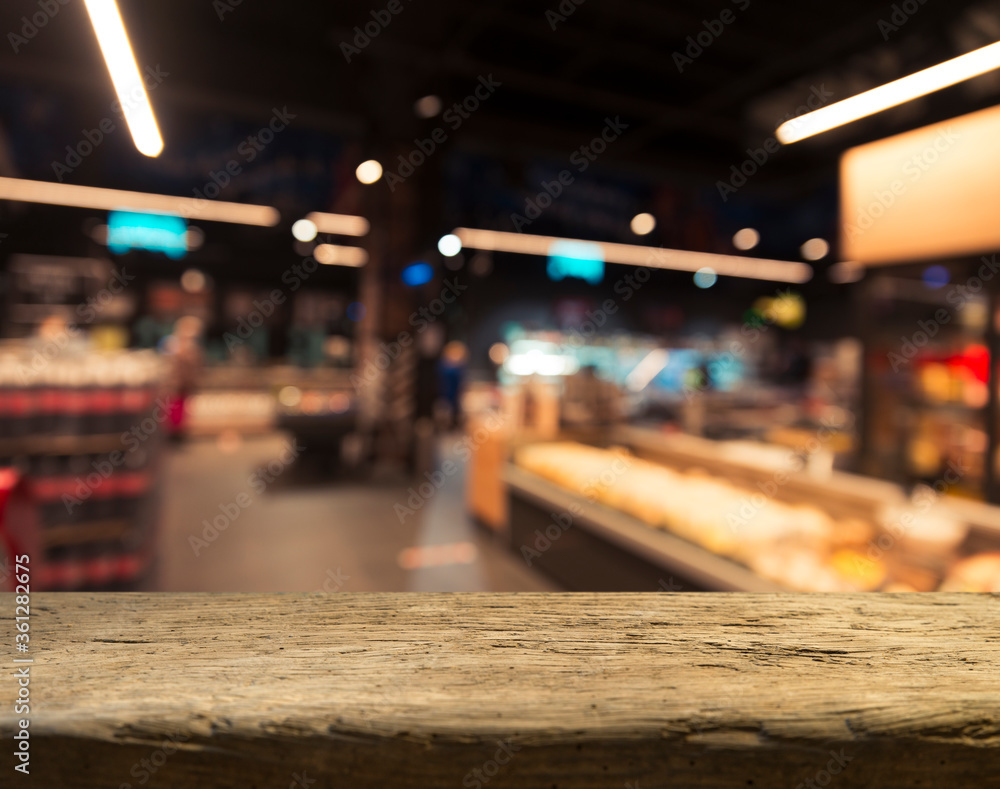 Empty wood table top on blurred market fruit. can montage or display your products Empty wood table top on blurred market fruit. can montage or display your products