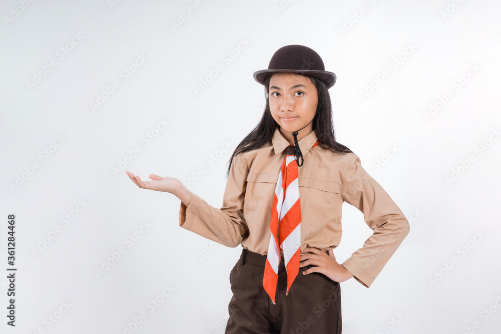 junior high school teen student presenting to copy space wearing uniform
