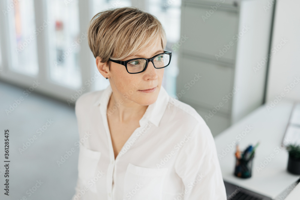 Thoughtful woman watching to the side Thoughtful woman watching to the side