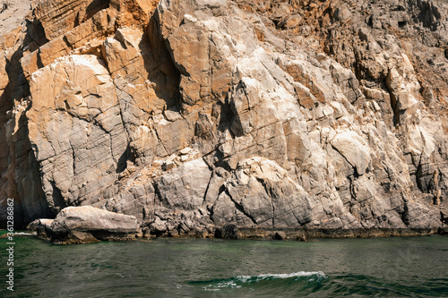 Rocky cliff with the sea. © Nika Votinova