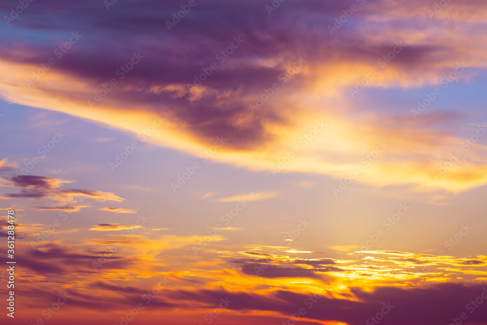 Beautiful view of colorful sunset sky with sunlight and clouds