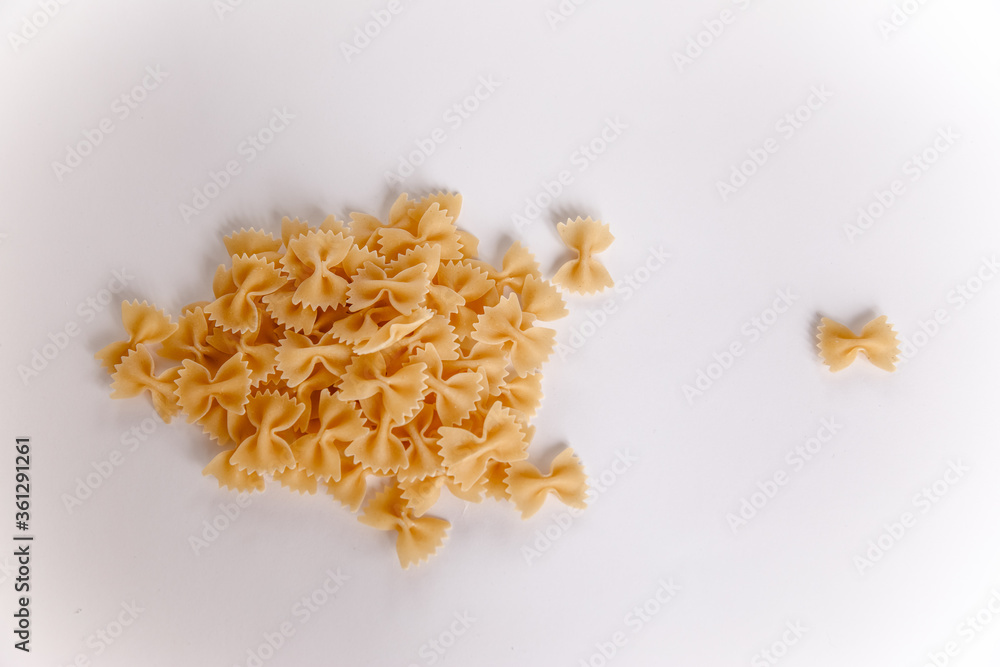 Obraz premium Pasta on a white background. bow. Variety of types and shapes of Italian pasta.