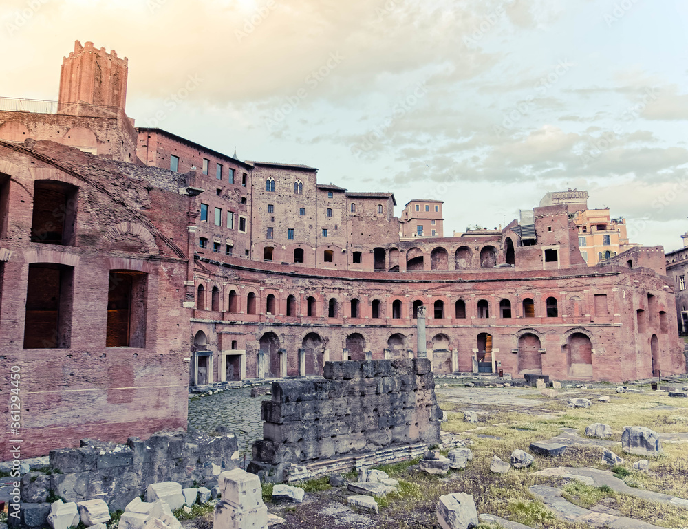 golden hour in Rome Italy, the Trajan's forum and market view with militias tower on the background